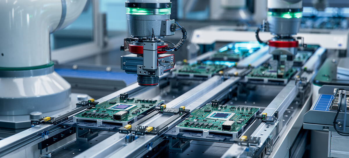 A production line manufacturing printed circuit boards.