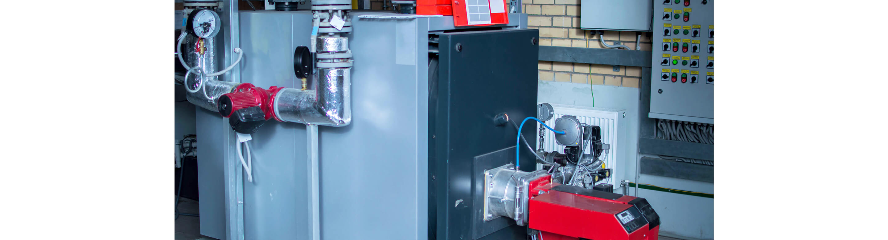 An industrial boiler and a gas burner at a plant