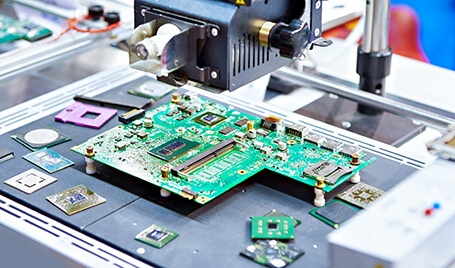 Electronics are being manufactured at a factory.
