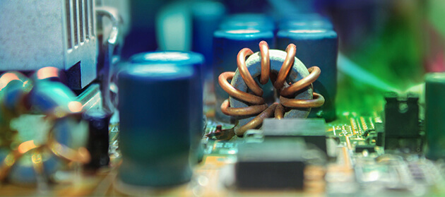 An inductor coil on a power electronics PCB.