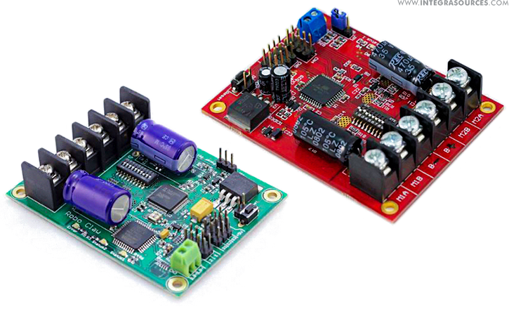 A green and a red BDC motor controllers designed by Integra Sources.
