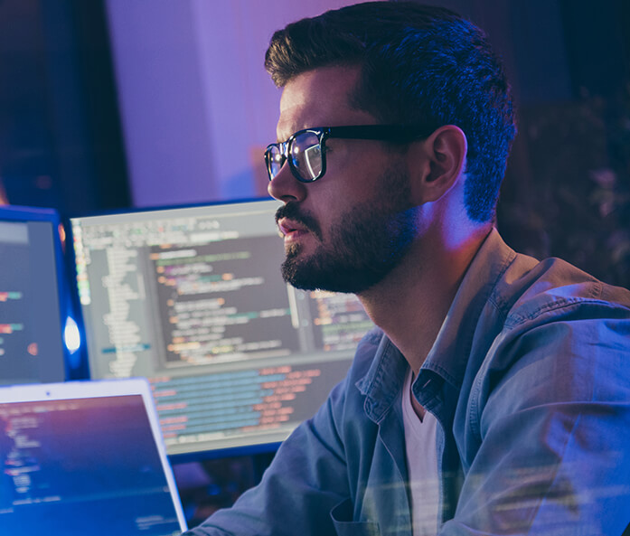 Two Integra Sources engineers working on a board support package