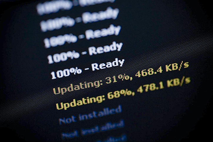 Computer screen showing the update progress. Challenges of firmware updates.