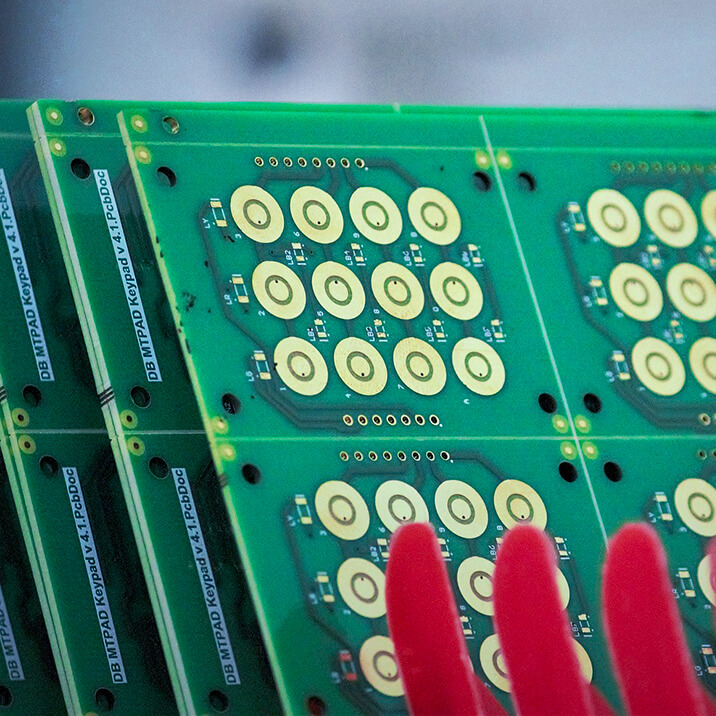 A stack of printed circuit boards.