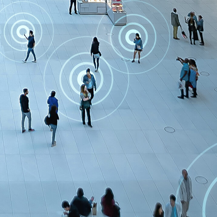 People walking through a shopping mall.